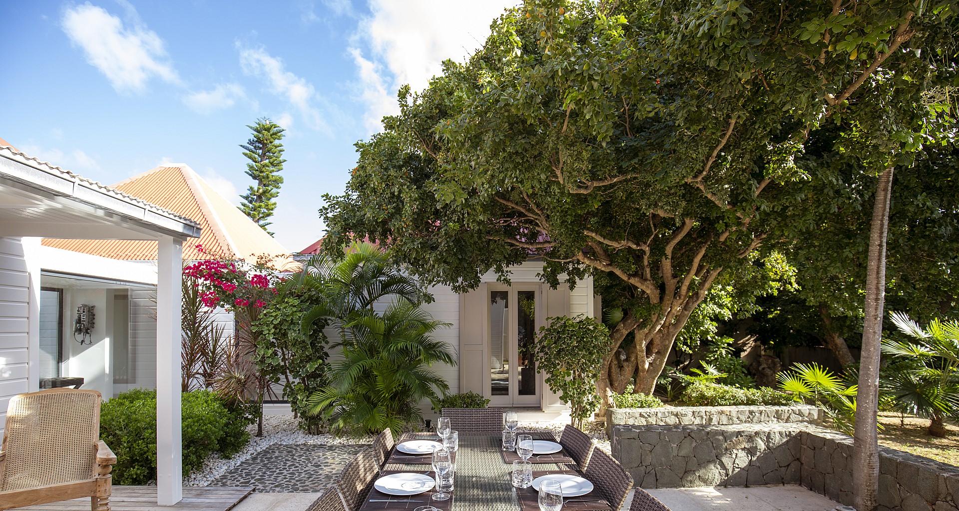 Private villa terrace in St Barts with serene poolside setting and panoramic coastal vistas.