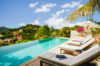 Infinity pool of St Barts villa hire with sun loungers and hillside views
