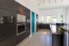 Modern kitchen in rentals villa St Barts with sleek cabinetry and natural light