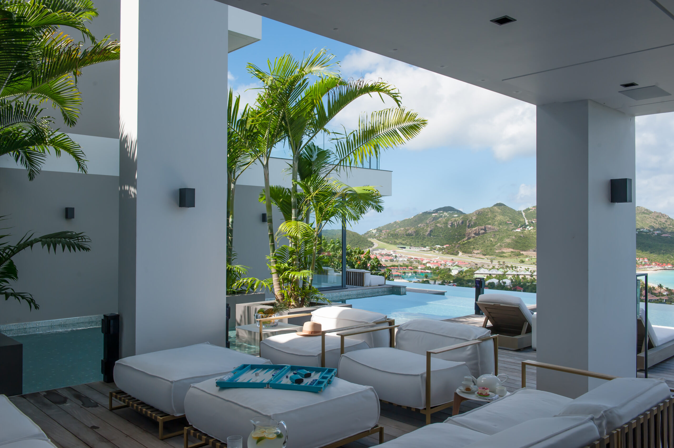 Outdoor deck view at Villa Neo, St Barts, opening to the Caribbean horizons.