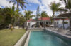 Luxury St Barts villa terrace with infinity pool and panoramic views of the Caribbean coastline.