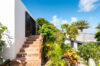 Private villa rentals in St Barts with stone steps leading to tropical garden suites