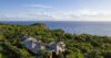 Secluded St Barts villa surrounded by lush greenery with panoramic ocean views from the hillside