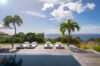 The outdoor deck at Villa Viewing Deck in St. Barts offers stunning sea views.