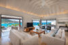 Bright open-plan living room with sea views in a luxury St Barts villa rental