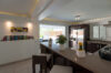 Modern kitchen with breakfast bar and garden view in a St Barts villa rental