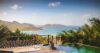 Infinity pool with panoramic view of mountains and sea at private villa rental in St Barts