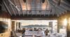 Luxury open living room in St Barts villa with sunset ocean views and elegant décor