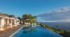 Expansive infinity pool with panoramic Caribbean Sea views at luxury St Barts villa rental.
