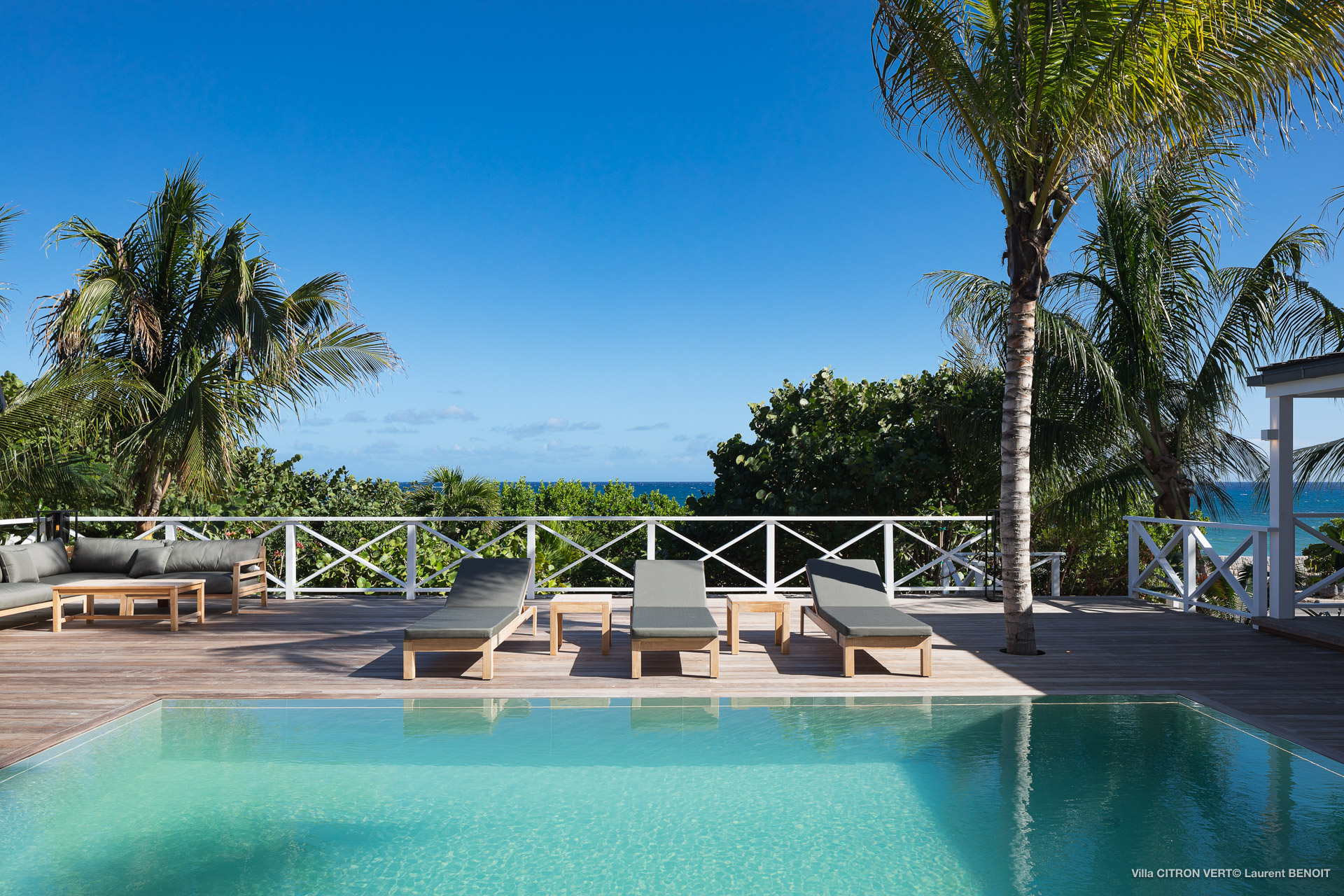 Scenic view in a private pool, St Barts, blending the sea and sky.