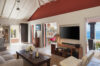 Bright living room with modern decor and ocean view in a St Barts villa rental