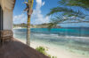 Beachfront terrace with wooden deck and ocean views at a private villa in St Barts