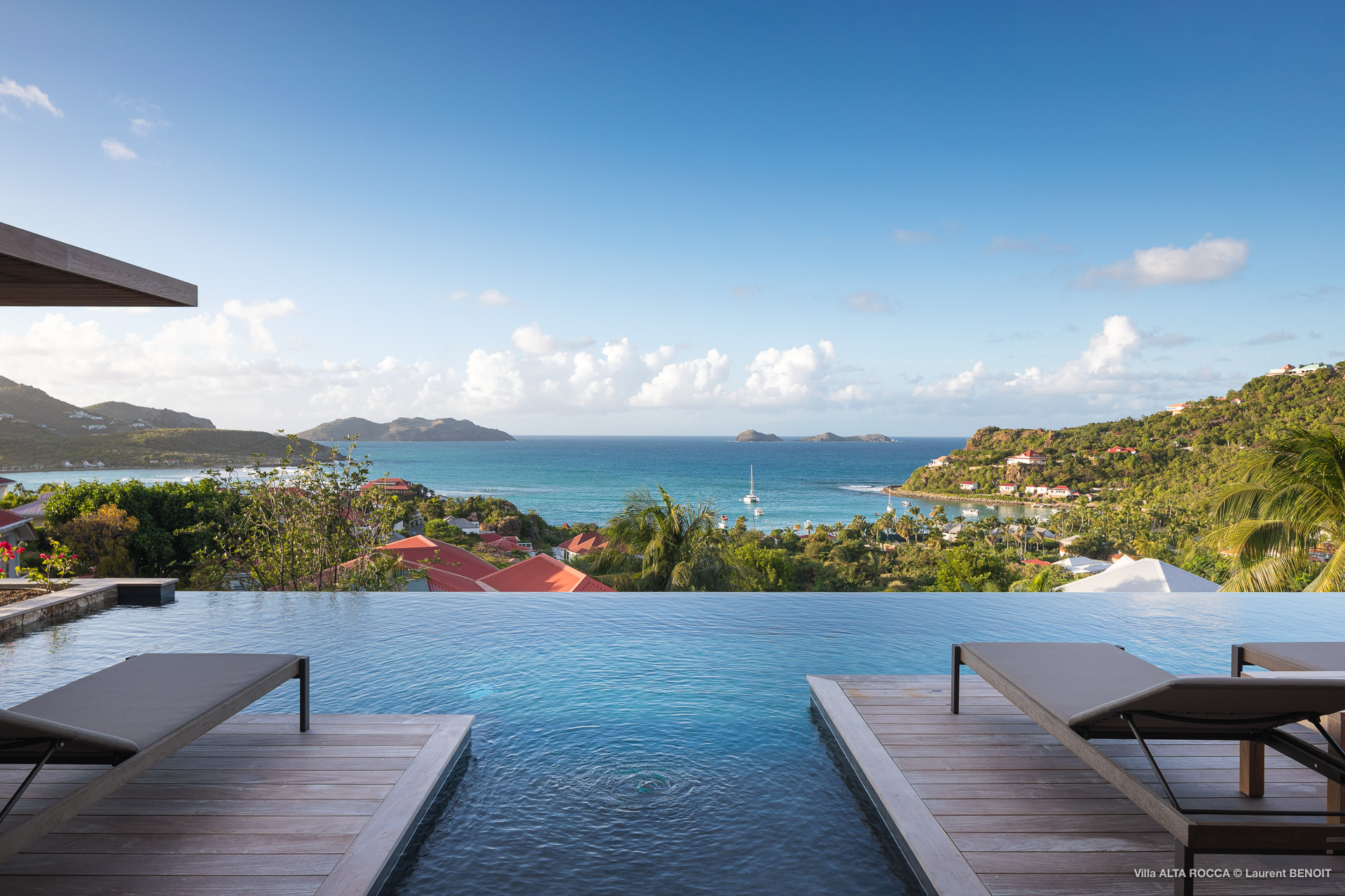 Infinity pool with sun loungers and sweeping Caribbean Sea views at a luxury St Barts villa rental