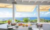 Breakfast table set with fresh pastries and fruit overlooking ocean views at St Barts villa rental