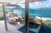 Luxury St Barts villa with infinity pool and terrace overlooking turquoise Caribbean bay