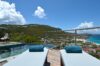 Sun loungers on terrace with plunge pool and panoramic ocean views at St Barts luxury villa