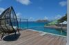 Private plunge pool with deck seating and ocean views at a St Barts villa rental