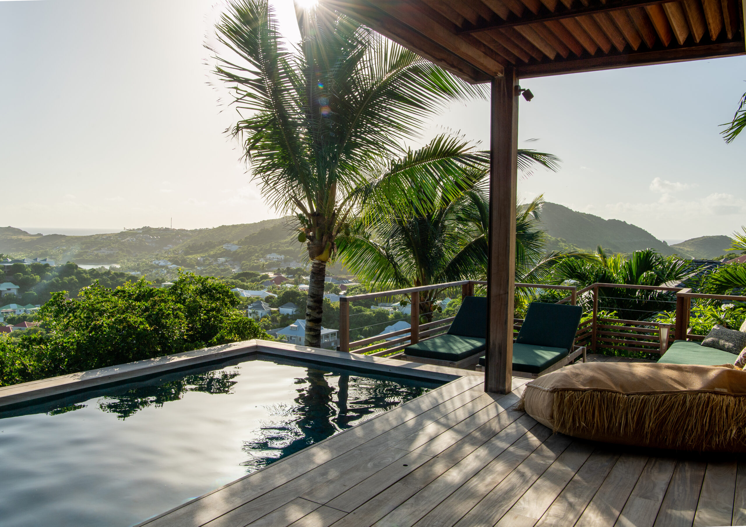 Every day, enjoy the ease of the pool at Villa Kaz in St. Barts, surrounded by light scenery and coastal calm.