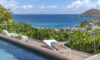 Cliffside villa terrace with pool, sun loungers, and panoramic ocean views in St Barts luxury rental