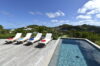 Private plunge pool with sun loungers on deck at hillside St Barts villa rental