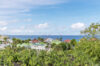 Scenic hillside village and ocean view from a St Barts vacation rental