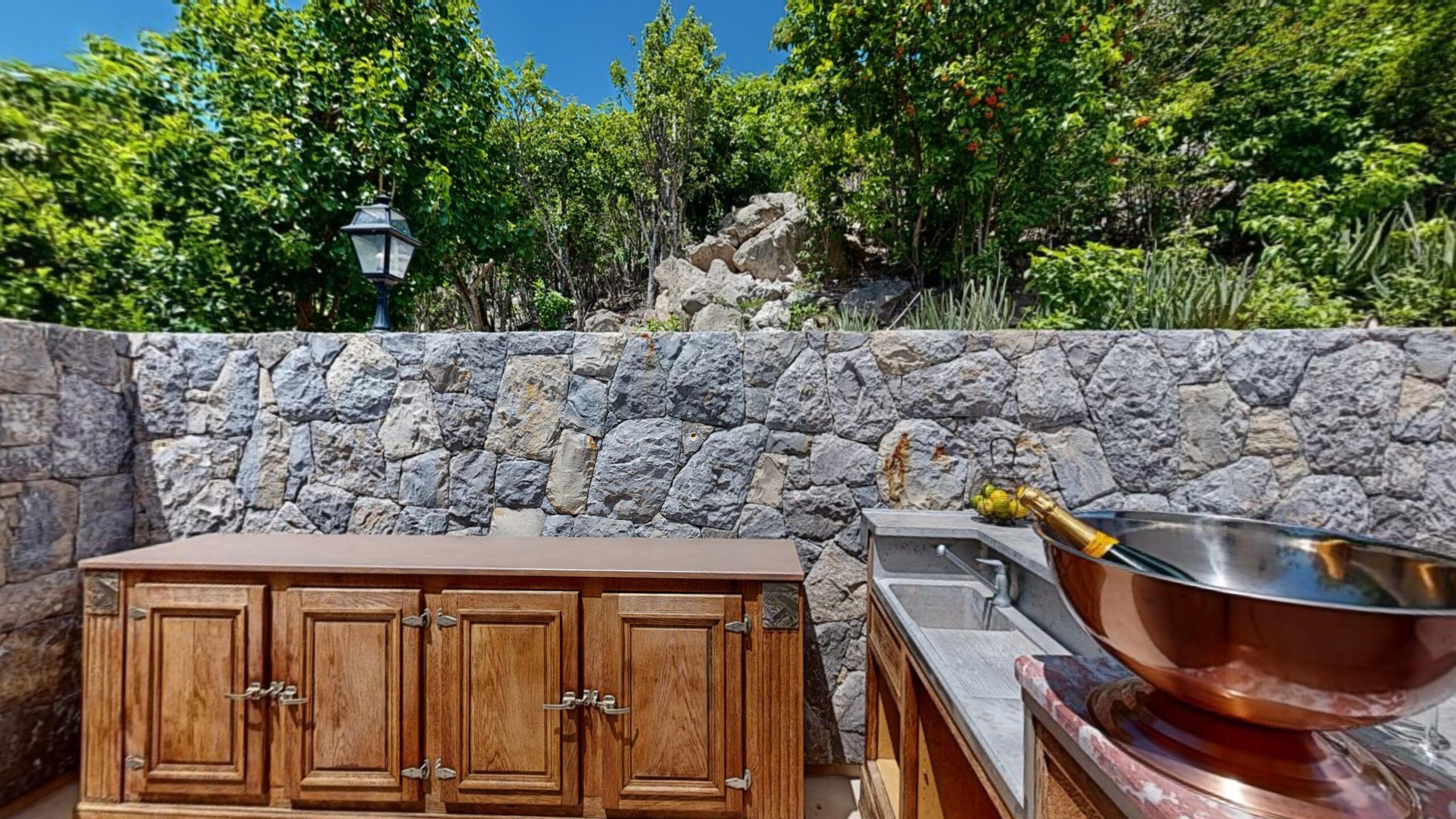 The Villa Vogue outdoor kitchen in St. Barts is perfect for outdoor dining.