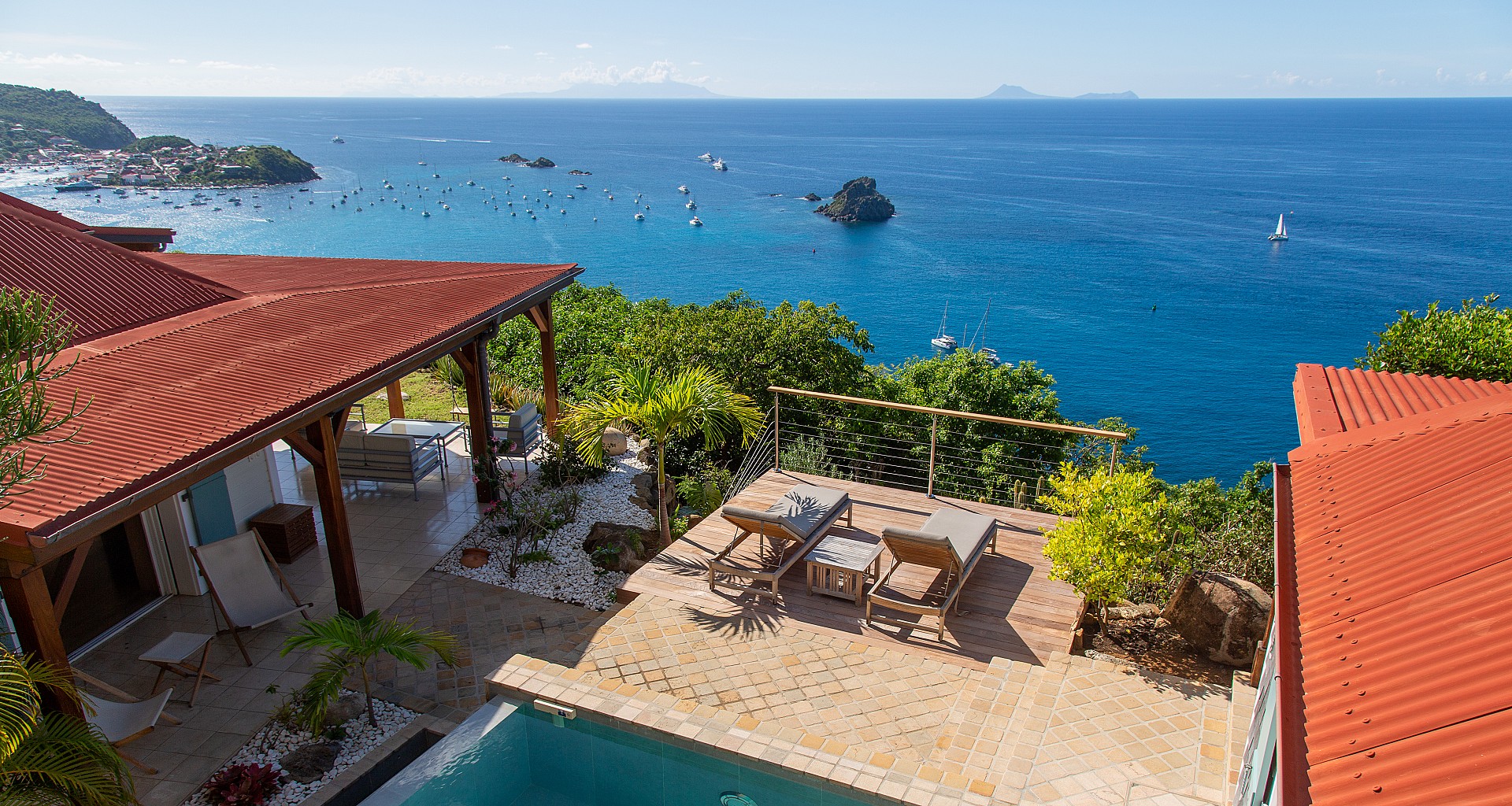 Clifftop St Barts villa terrace with pool and panoramic Caribbean sea view
