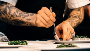 Private chef artfully plating gourmet cuisine at a luxury villa in St. Barts | St. Barthélemy Villas