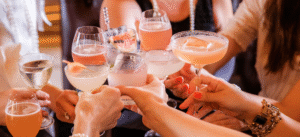 Guests toasting with cocktails during a luxury villa stay in St Barts.